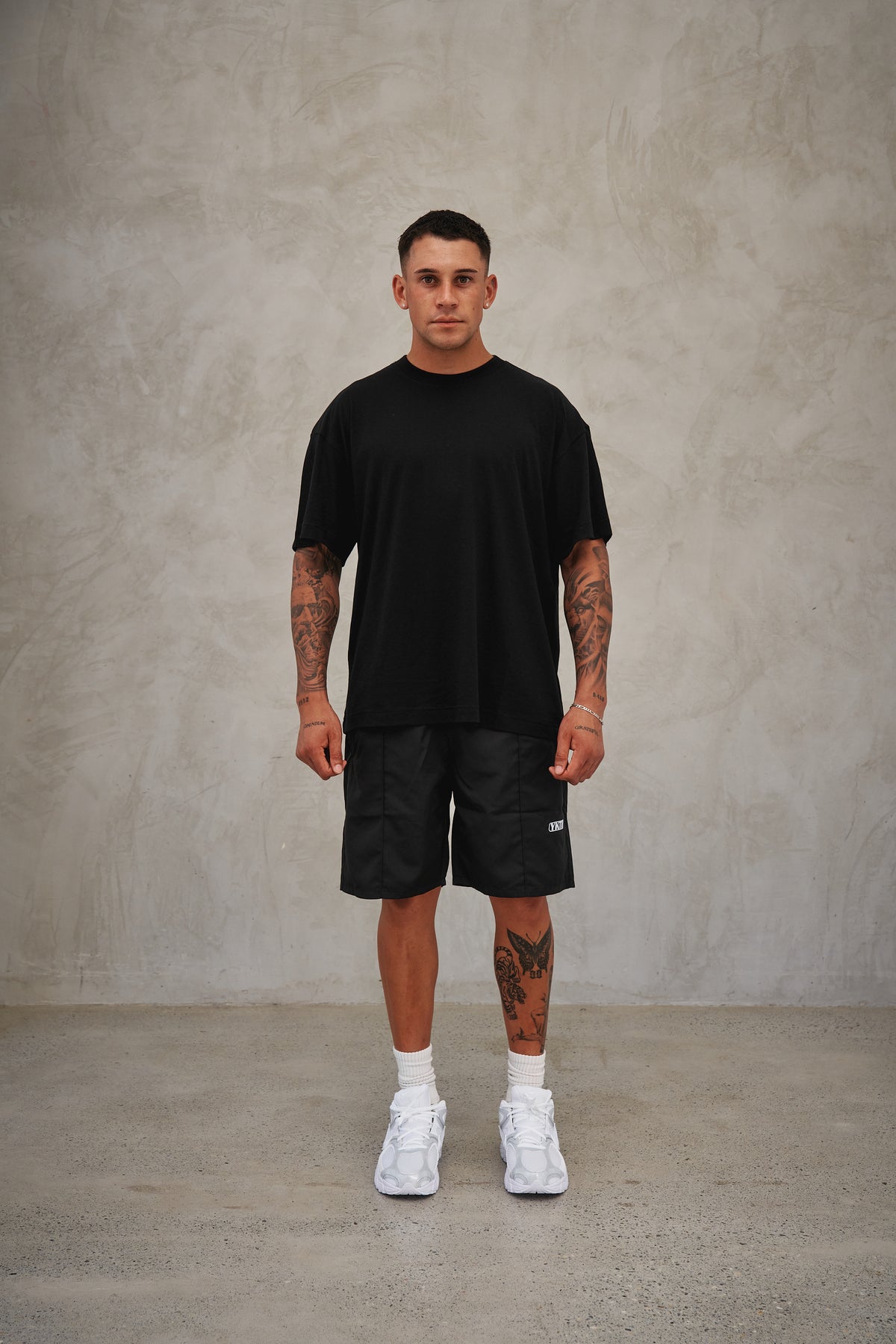 GOLF PLEAT SHORT - BLACK